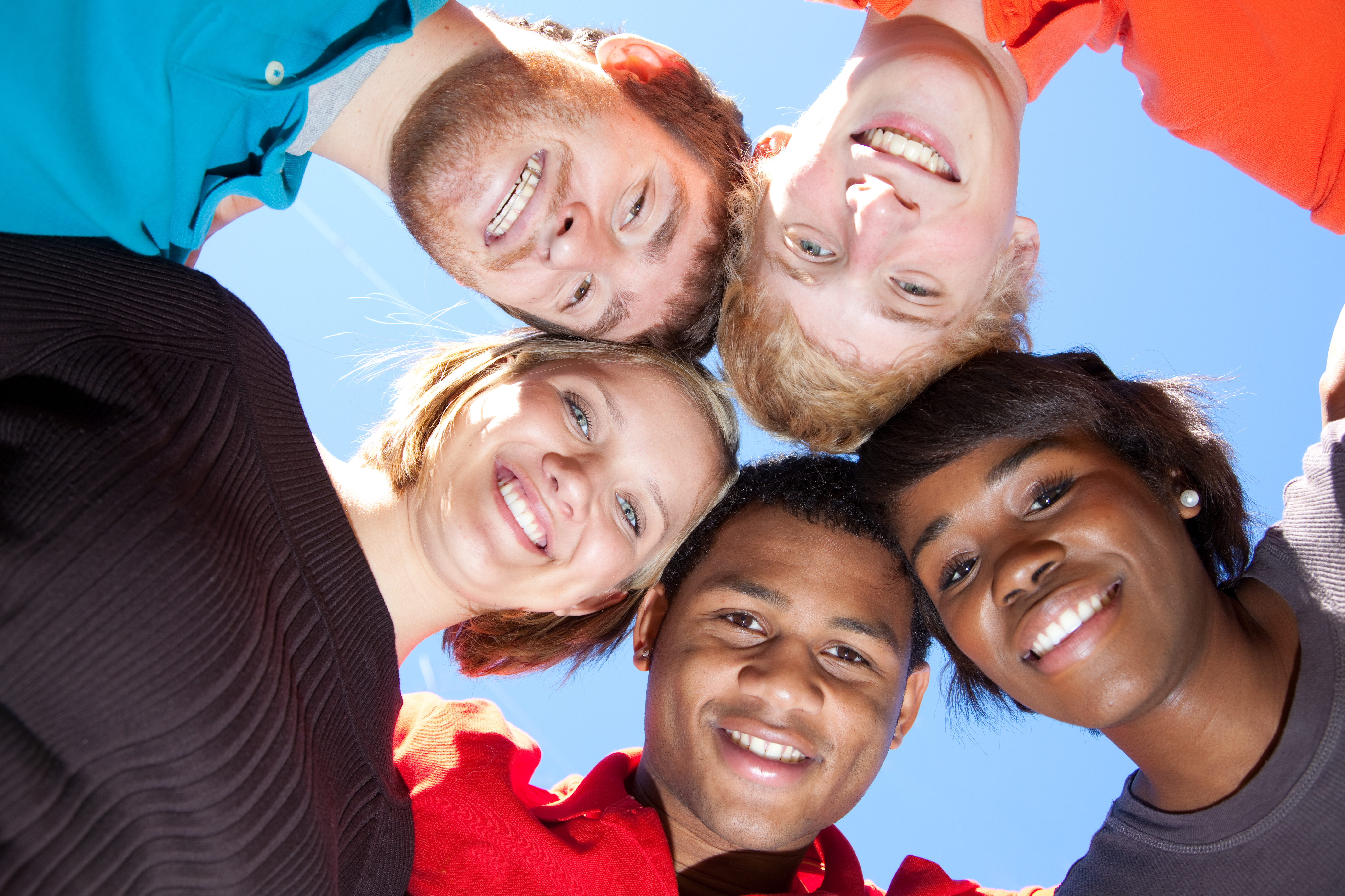 Faces of smiling Multi-racial college students