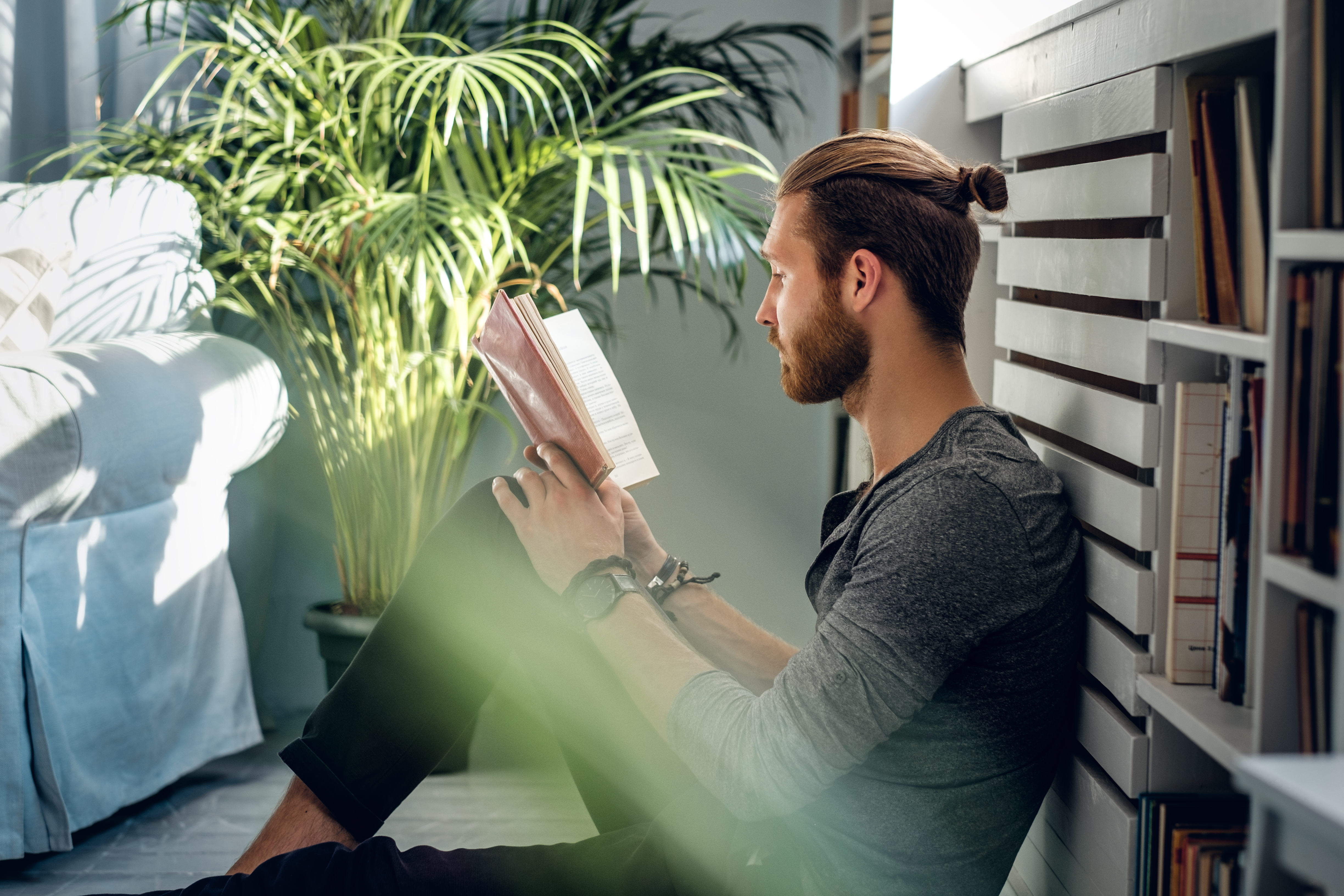 A man reading a book.
