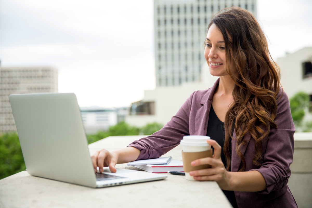 Woman on computer e1526270504736