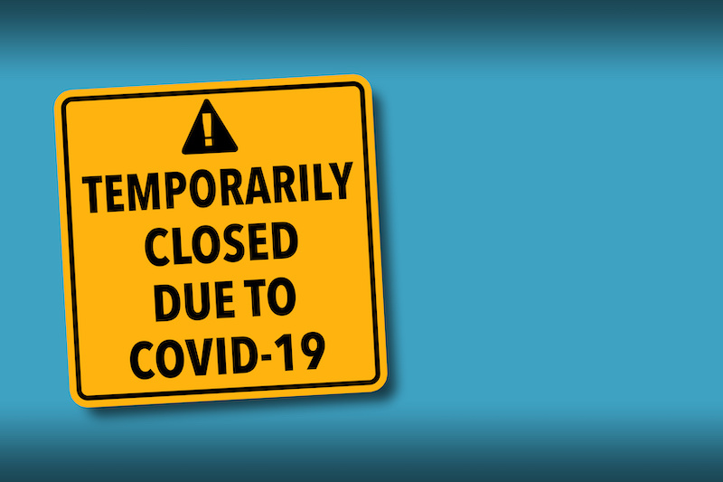 temporarily closed covid sign